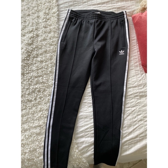 Adidas Superstar pants.